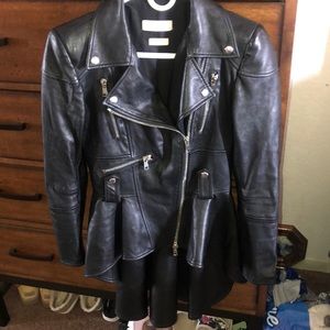 a little rip in the top of his Harley not noticeable